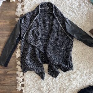 Boutique sweater with Leather Sleeves